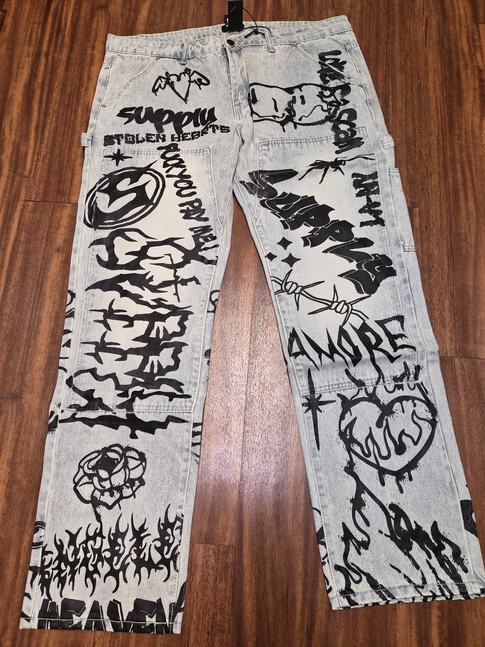 Light Blue Men’s Relaxed Jeans with Black Graphic Print